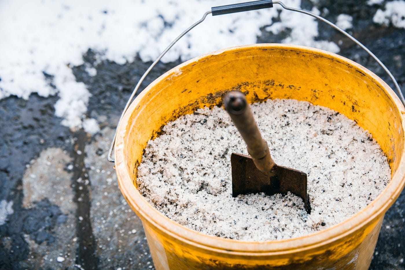 bucket of road salt for ice removal